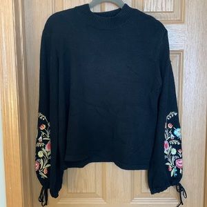 Black Knit Sweater with Floral Design on Bell Sleeves